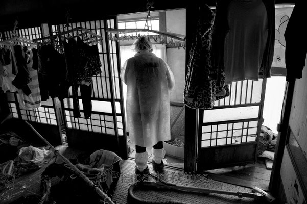 Residents going back home to collect their belongings, Tomioka city, Fukushima "No-Go Zone", Japan.