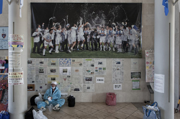Worker preparing to go to work, J village, the Tepco headquarter, Fukushima "No-Go Zone", Japan.