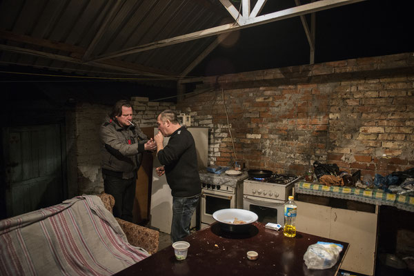 Chernobyl town, Yuriy and Valeri meet up sometimes at Valeri's house to spend the evening together.