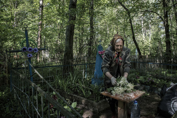 Former inhabitants visiting the graves of their deceased in the city of Chernobyl.