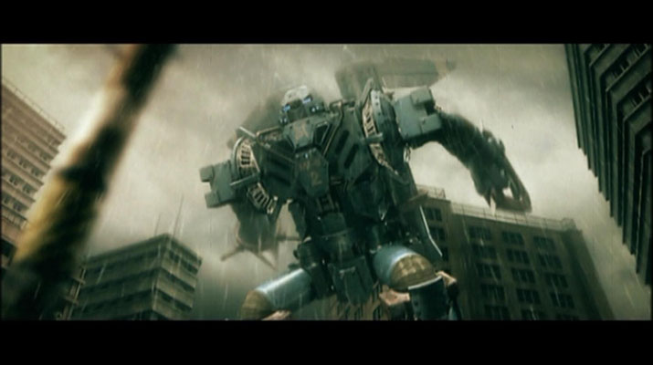 Der Riesen-Superroboter MI-6 2 steigt in die Lüfte, um gegen NEGADON anzutreten. Für den gräulichen, verwaschenen Look programmierte Jun Awazu eigens einen eigenen Filter. Er soll dem Betrachter das Gefühl eines alten Kaiju-Filmes vermitteln