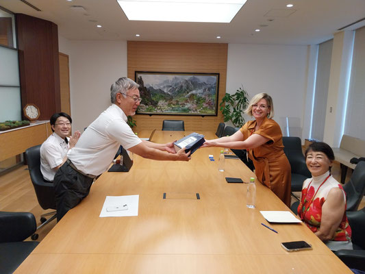 A Vassallo and Mitsutaku Makino(President of OPRI) (standing); in foreground, Emeritus IOI Japan Director, Masako Bannai Otsuka