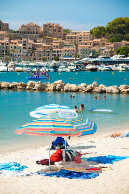 Colorful umbrellas on Puerto de Soller, Port of Mallorca island in balearic islands, Spain by Romas_Photo