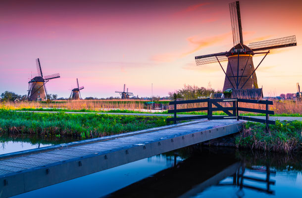 Sunset in Dutch village Kinderdijk near the Hague, Netherlands by Andrew Mayovskyy