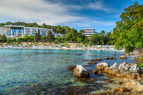 Stunning beach with luxury hotels and white parasols,Rovinj,Istrian peninsula,Croatia,Europe -Gaspar Janos