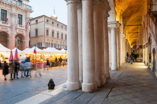 View of the columns and arches of the Palladian Basilica in Vicenza at dusk Copyright Marco Ossino