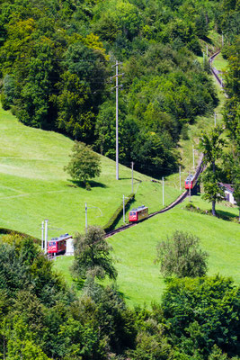 Swiss alpine cog railway train climbing up to the Pilatus mountain, near Lucerne, Switzerland Copyright Milosz Maslanka