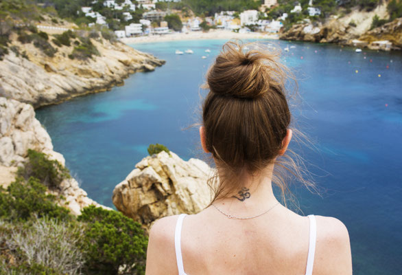 Ibiza - European Best Destinations - Girl looking at the beach in Ibiza Copyright Icealex