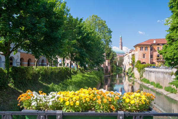 Flowered balcony of Monte Furo in Vicenza, Italy, with a view of retrone river and the clock tower in the distance Copyright Marco Ossino