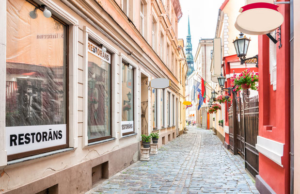 Narrow medieval street in old town Riga, Latvia Copyright elesi