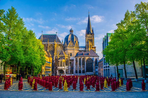 People are taking pictures of exhibition Mein Karl in german Aachen in front of local cathedral by pavel dudek