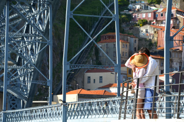 Lovers on the famous Luis I Bridge, Porto, Portugal © European Best Destinations