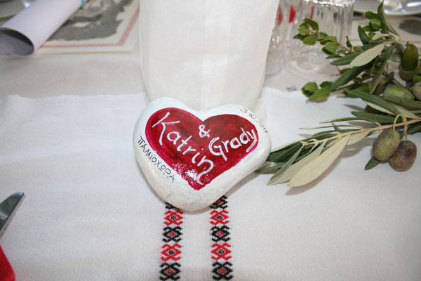 hand painted stone with the names of bride and groom