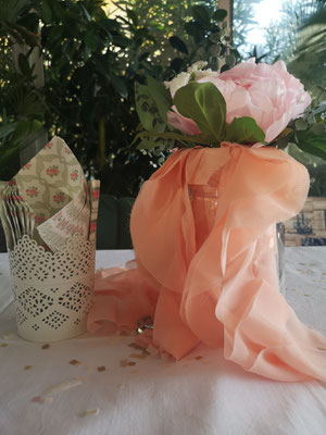 flower bouquet with pink cloth as a decoration for a wedding