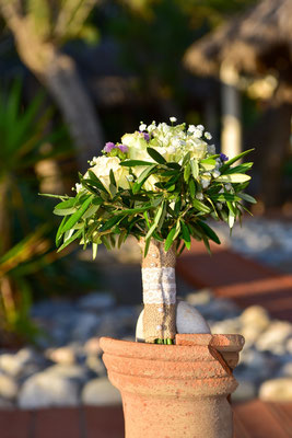 wedding bouquet on a clay vase 