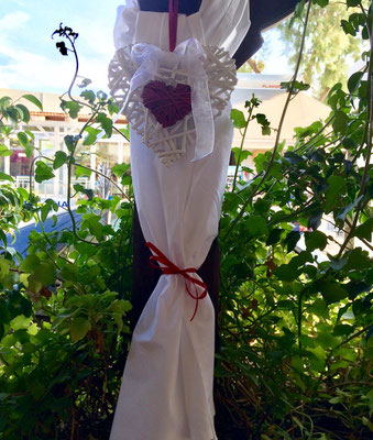 wall deco with white hearts and white cloth