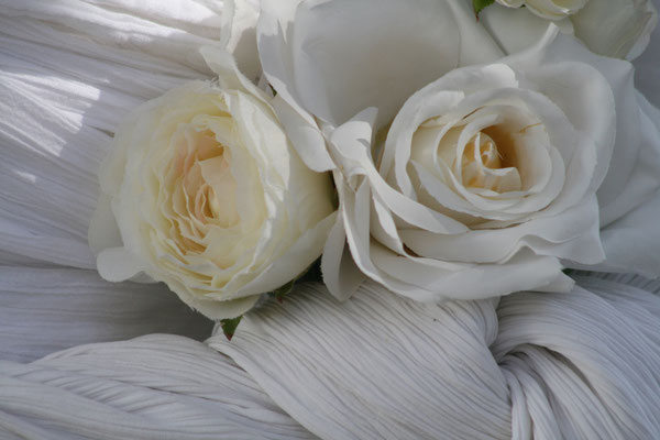 white silk flowers as a  wedding decoration