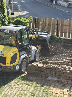 Restarbeiten Mutterboden für Garten
