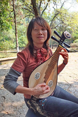 Muziek maken in het park van Yangshuo.