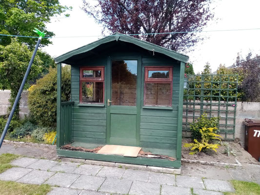 Garden shed placed on newly laid patio – professional paving and outdoor installation