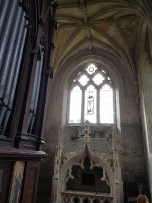 Windows of church show three versions of 13th and 14th century Decorated