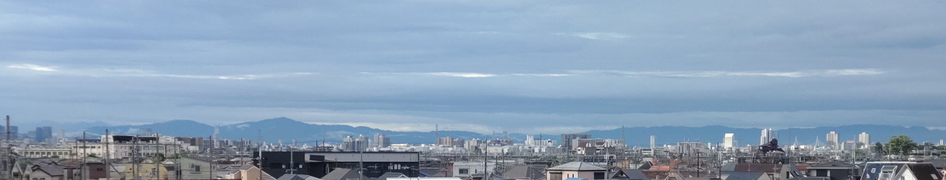 HPトップに使っている画像　当地より南側、阪神間　紀伊山地を望む　中央左は金剛山