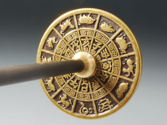 Handspindel aus Münze