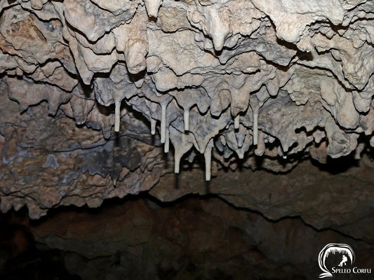 Stalactites hanging from the ceiling.