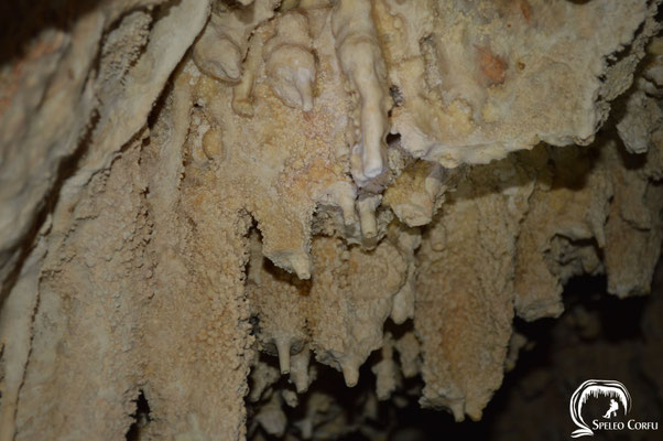 Stalactites hanging from the ceiling.