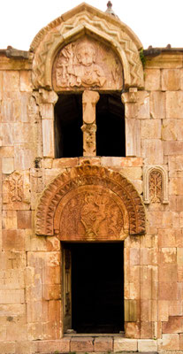 The façade of Surb Karapet Church with a striking depiction of God the Father (upper relief)