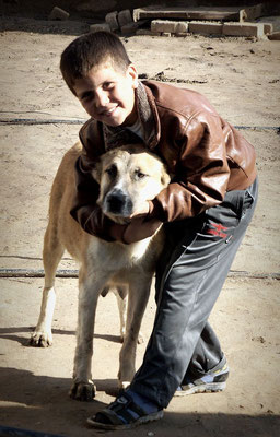 Mary, Turkmenistan - boy with his dog