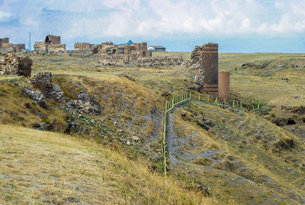 Fortifications. A modern border fence can be seen at center, Armenia is on the right, Turkey, on the left