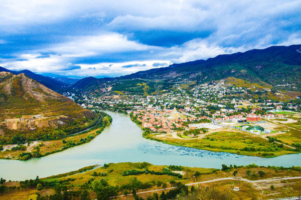 Mtskheta, at the confluence of the rivers Kura (in the middle) and Aragvi which flows from the north (right) direction Tbilisi (left) - In the center of the picture the Svetitskhoveli Cathedral 