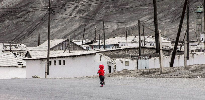 Little girl on the main street in Murghab, Gorno-Badakhshan Autonomus Region, Tajikistan. 