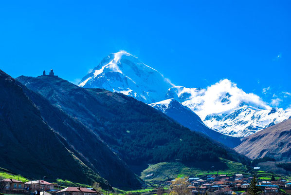 The Mt.Kazbek (5049 m), is one of the highest and most beautiful mountains of Caucasus