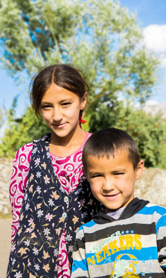 Tajikistan, village of Vrang - Muslima and her brother