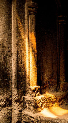 A sunbeam illuminates a column