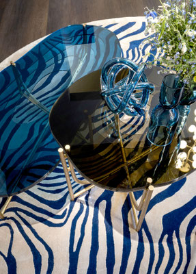 Tahoe Side Table by Luca Tornaghi for Roberto Cavalli Home, sculptural side table with fluid forms that create depth through a combination of transparency and graphic rhythm.