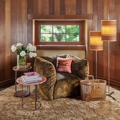 Cushy armchair designed by Luca Tornaghi for Etro Home, patterned fabric version with soft side cushions and grounded rounded shape