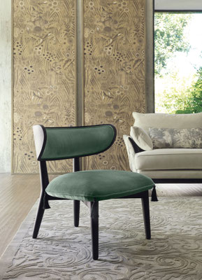 Shah armchair designed by Luca Tornaghi for Etro Home, green upholstered version showing the essential wooden frame and the balanced seat volume