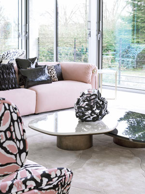 Malawi sofa by Luca Tornaghi for Roberto Cavalli Home, leather sofa with soft volumes and continuous surfaces