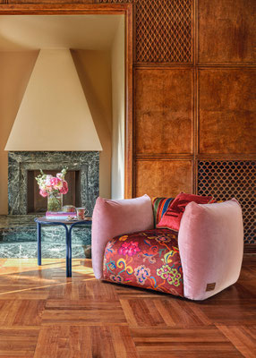 Cushy armchair designed by Luca Tornaghi for Etro Home, patterned upholstery variation with enveloping cushion structure and compact proportions