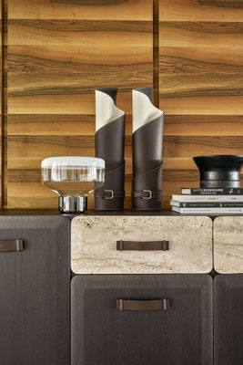 Coira vase designed by Luca Tornaghi for Gianfranco Ferré Home, where a continuous leather twist shapes the volume through sculptural tension and restrained material contrast.