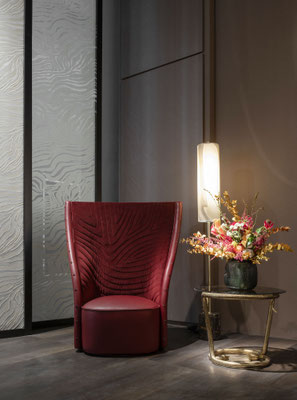 Nevada armchair designed by Luca Tornaghi for Roberto Cavalli Home, front view with compact seat and vertically developed backrest emphasising its architectural presence