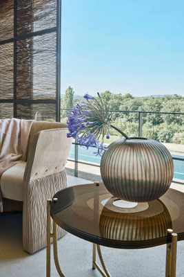 Tahoe coffee table by Luca Tornaghi for Roberto Cavalli Home, detail of the layered glass top revealing concentric forms and suspended material depth