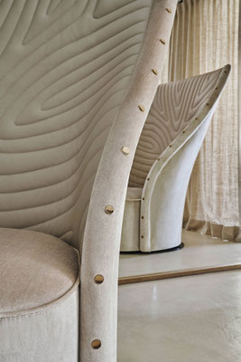 Nevada armchair designed by Luca Tornaghi for Roberto Cavalli Home, detail of quilting pattern and metal studs defining the perimeter of the structure