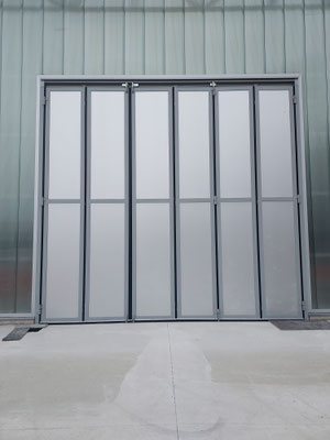 Société Métallurgique du Forez SMF porte SMF pliante accordéon- porte sur mesure Fabrication Française - ouverture rapide