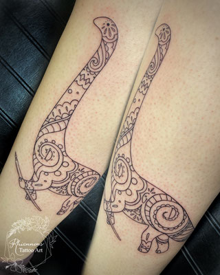 Dinosaur fineline ornamental tattoo