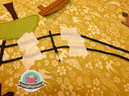 place the ribbon into the right position - this will represent the fence