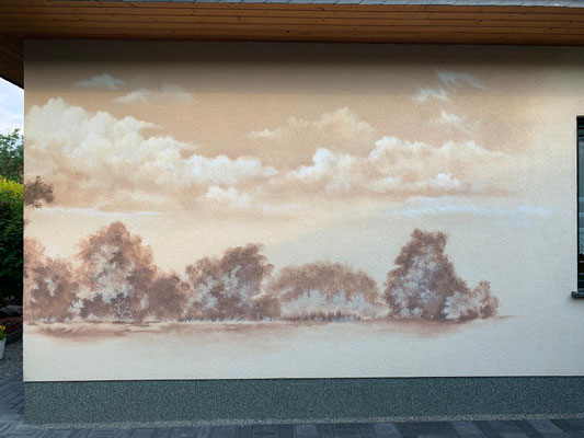 Hauswand bemalt mit Natur- Graffiti Auftrag